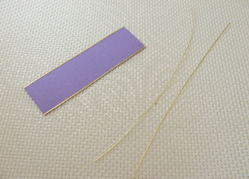 I cut the lavender paper into strips using a paper cutter 